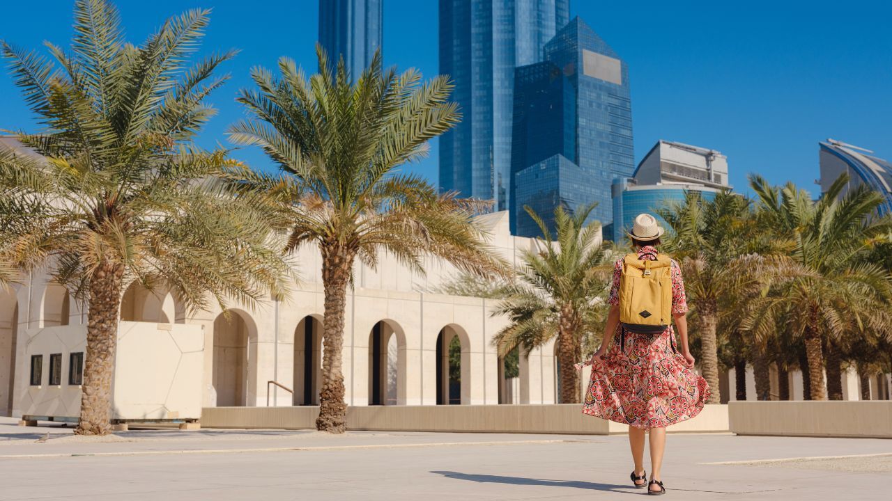 abu dhabi tourist Young woman exploring Qasr Al Hosn Park in Abu Dhabi