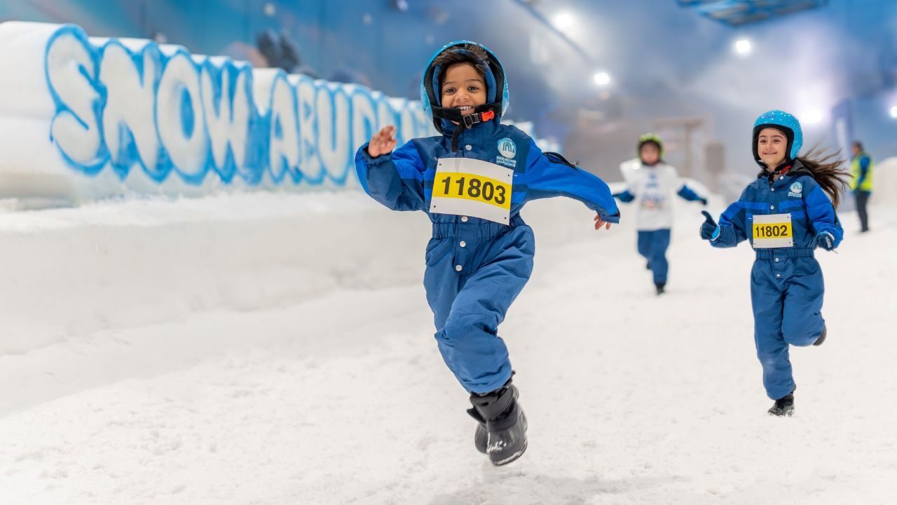 snow abu dhabi kids playing in the snow at snow abu dhabi