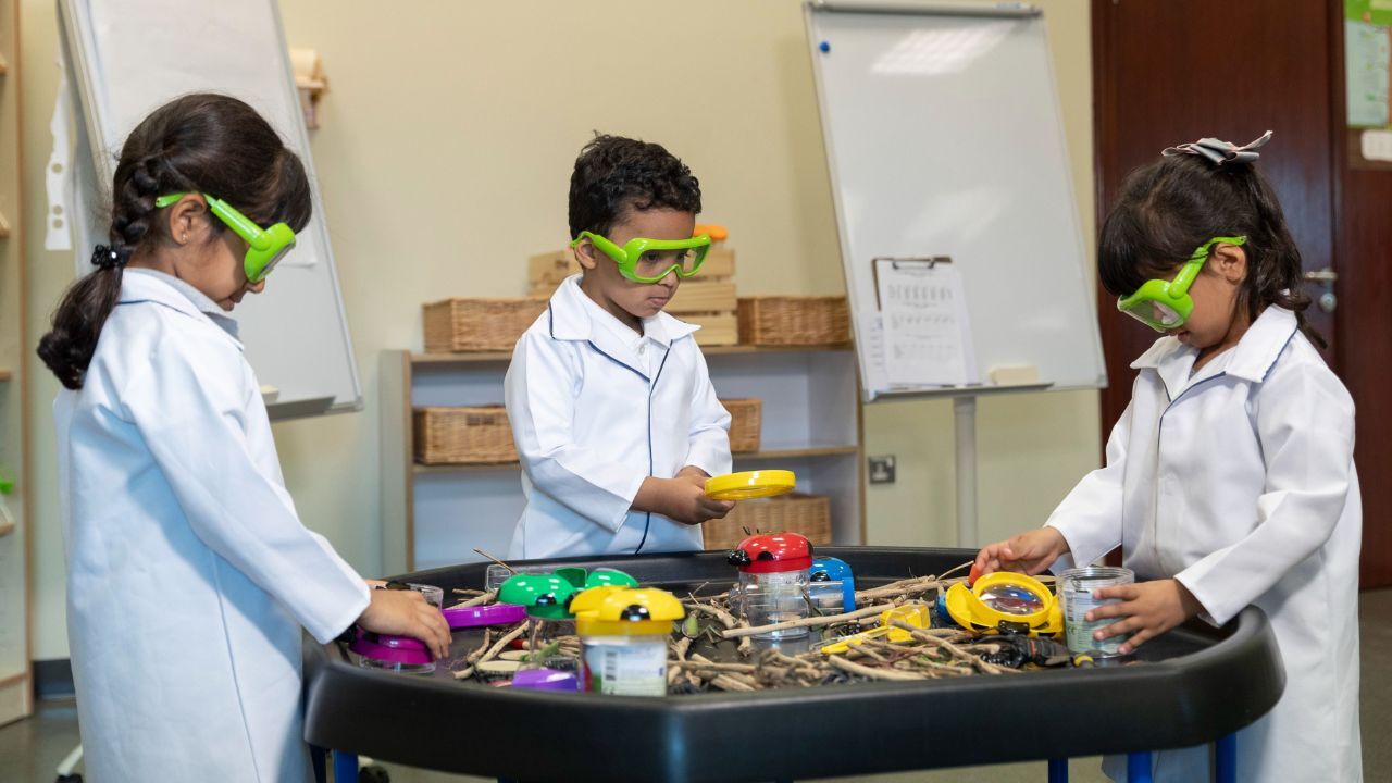 nursery kids children at their nursery creating experiments