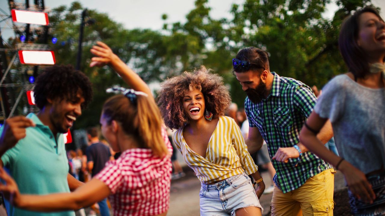 people dancing at a festival