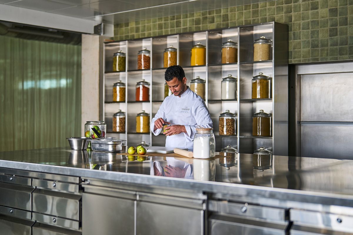 Ecole Ducasse Cooking classes Ramadan 2024 (5) A chef preparing ingredients at Ecole ducasse cooking class