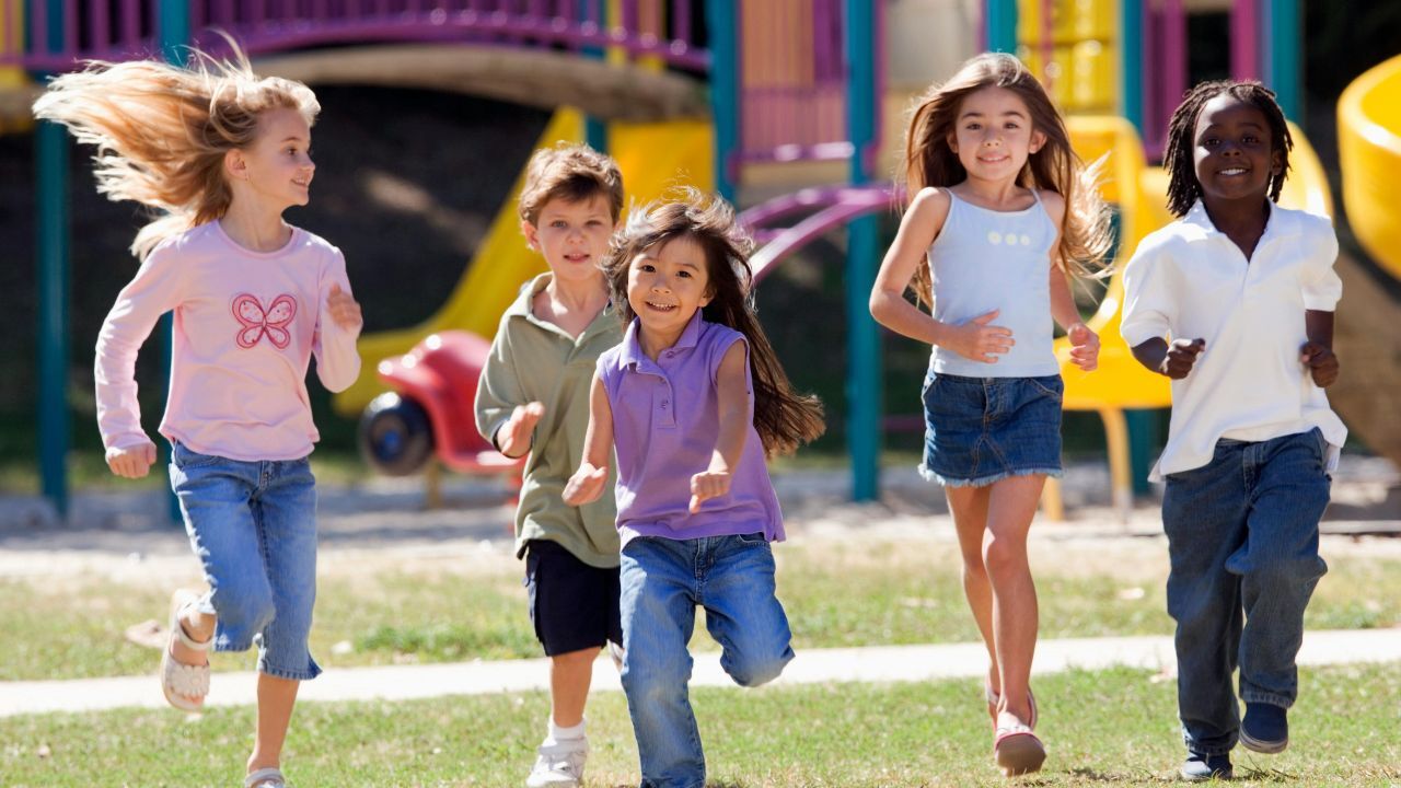 spring camps spring camps kids running at park or greenery