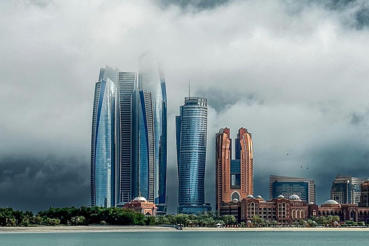 Abu Dhabi cloudy day Abu Dhabi skyline featuring Etihad Tower on a cloudy day