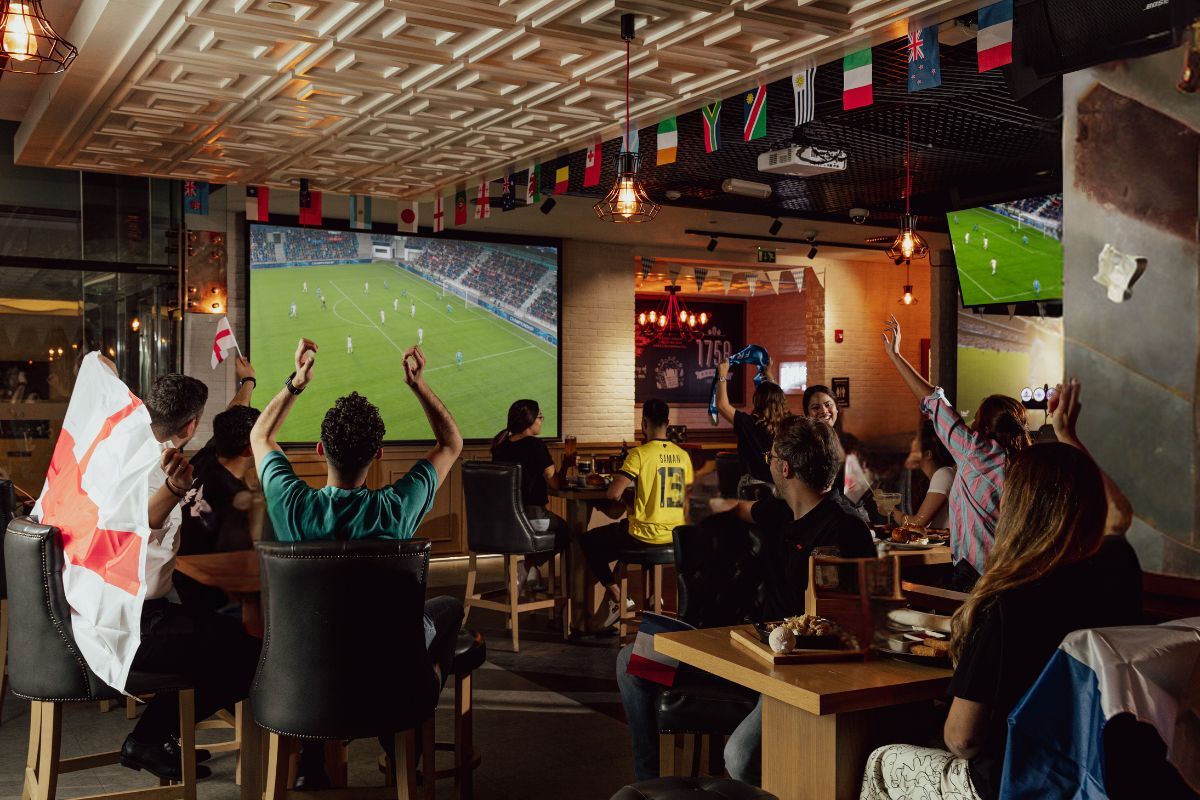 People watching football at Bridges Bar at Fairmont Bab Al Bahr Euro 2024 in Abu Dhabi People watching football at Bridges Bar at Fairmont Bab Al Bahr Euro 2024 in Abu Dhabi