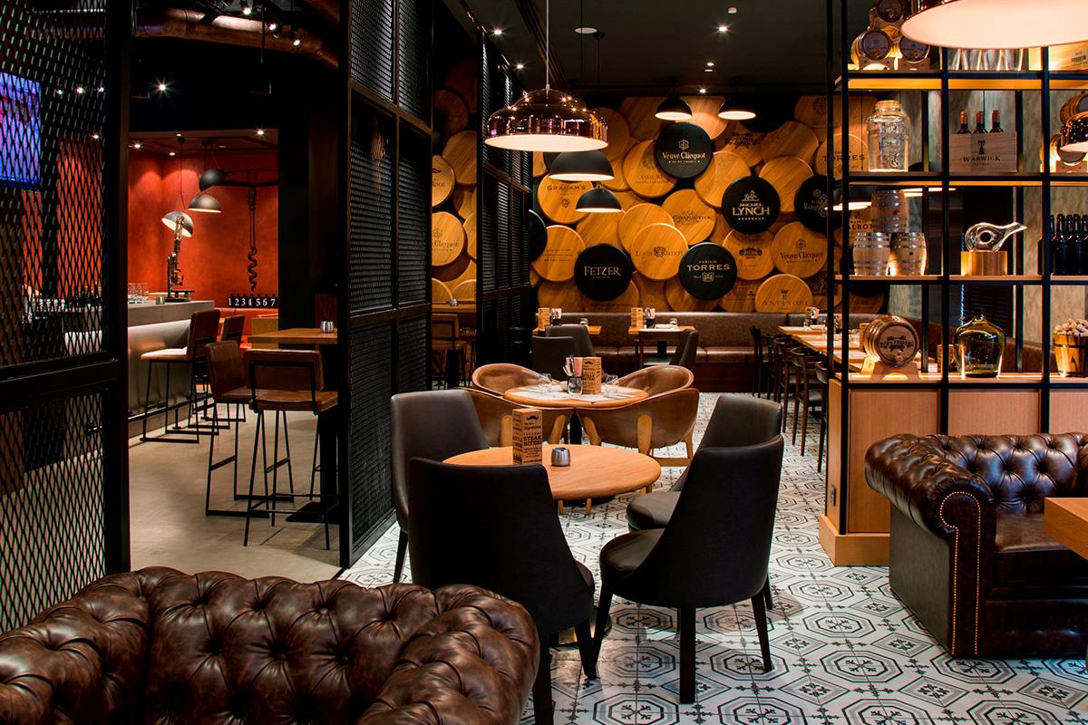 The Warehouse at The Pearl Rotana Abu Dhabi The Warehouse Grapes and Tapas Bar at Pearl Rotana Abu Dhabi interior dining and bar design