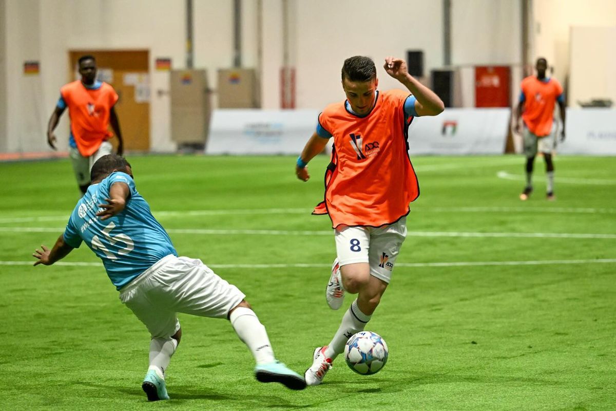 ADQ players playing football or soccer for Abu Dhabi Summer Sports